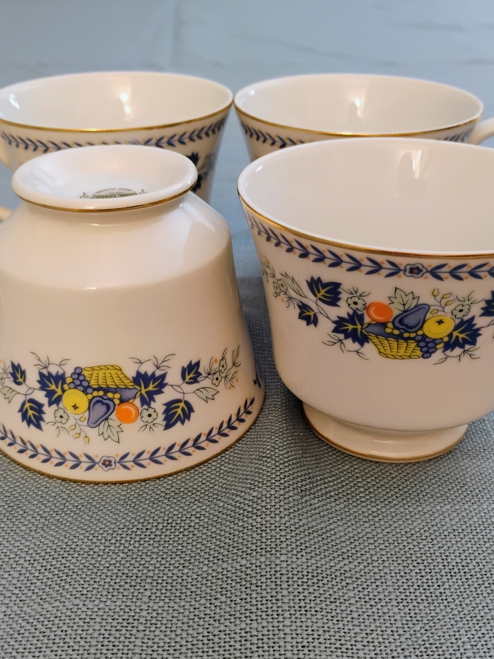 Porcelain Teacup Set with Blue Leaf and Fruit Basket Motif - White and Blue